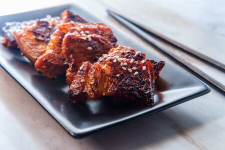 Spicy korean pork belly bolgogi with barbecue char marksの写真素材