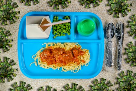 School lunch with deadly coronavirus microbes infecting the air conceptの写真素材