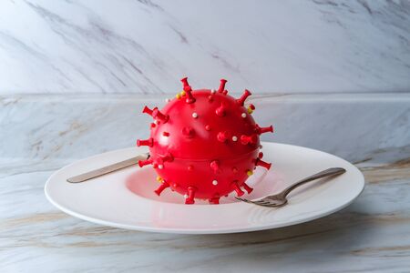 Coronavirus in bowl at restaurant as metaphor for the current state of the food industryの写真素材