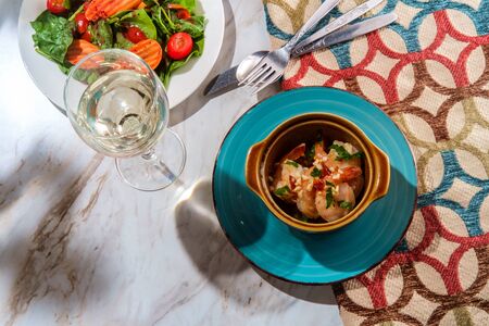 Portuguese gambas al ajillo garlic shrimp in terracotta cazuela de barro bowl