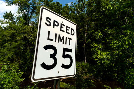 Speed limit thirty-five traffic safety sign on side of the road