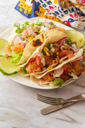 Crispy fried boom boom shrimp tacos with riceの写真素材