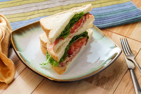 BLT Bacon lettuce and tomato club sandwich on rye bread untoasted