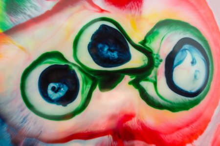 Strange abstract patterns made using milk and paint to be used as backgroundの写真素材