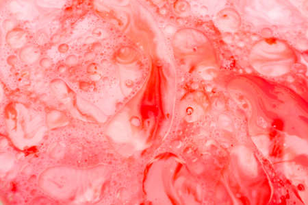 Strange abstract patterns made using milk and paint to be used as background