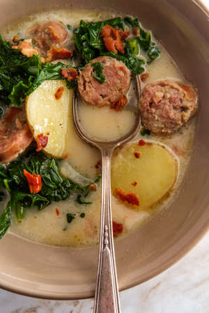 Sausage and kale zuppa toscana italian creamy potato soupの写真素材