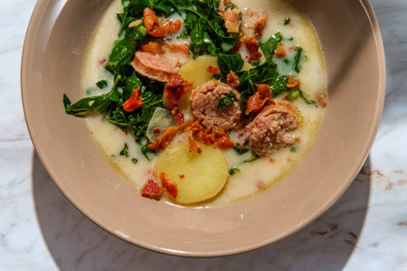 Sausage and kale zuppa toscana italian creamy potato soupの写真素材