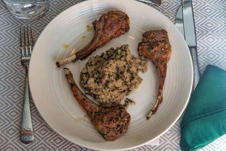 Marinated broiled lamb rib with cheesy mushroom risotto