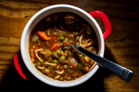 Italian vegetable soup in crock bowl with handles