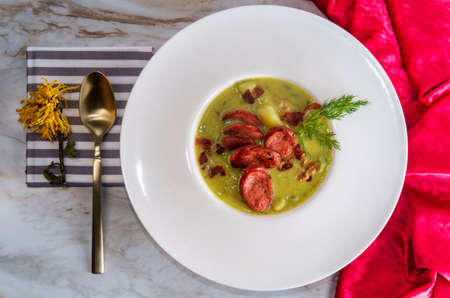 Creamy potato bacon and sausage soup also called kartoffelsuppe