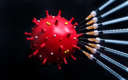 Vaccine needles to prevent spread of deadly coronavirus epidemic and reach herd immunityの写真素材