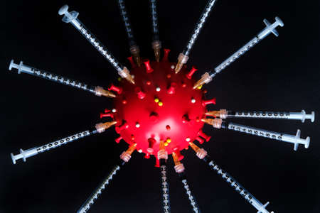 Vaccine needles to prevent spread of deadly coronavirus epidemic and reach herd immunityの写真素材