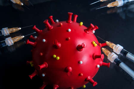 Vaccine needles to prevent spread of deadly coronavirus epidemic and reach herd immunityの写真素材