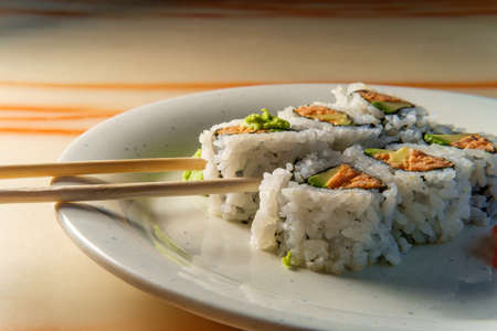 Japanese tuna sushi roll with pickled ginger and wasabi