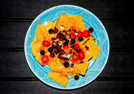 Simple beef nacho chips with chili and cheese