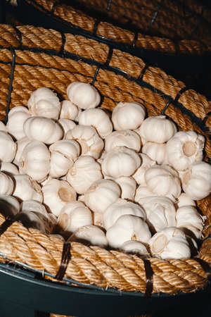 Garlic bulbs display in basket at local farmers market