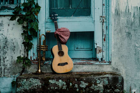 Traveling musicians trumpet and handkerchief picnic sack on a stickの写真素材