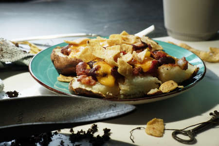 Gardener fresh twice baked potato with chili and melted cheddar cheeseの写真素材