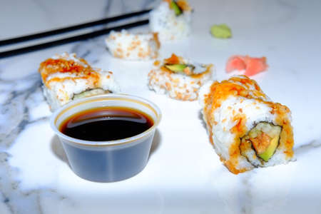 Barbecued Eel with avocado and cucumber Japanese sushi rollの写真素材