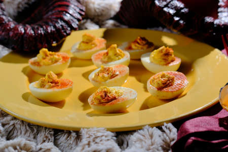 Satans recipe hellish deviled eggs with hornsの写真素材