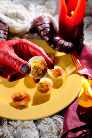 Satans recipe hellish deviled eggs with hornsの写真素材