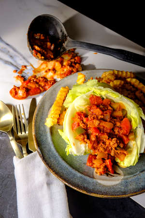 Sloppy Joe lettuce wraps with crinkle cut french friesの写真素材