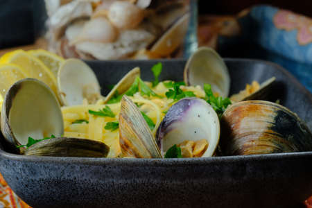Linguine with littleneck white wine clam sauce and parsley garnishの写真素材