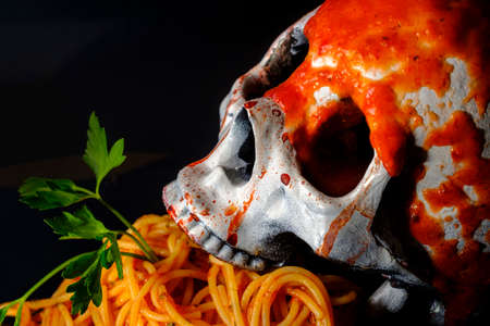 Starved to death skull now gets to eat lots of spaghettiの写真素材