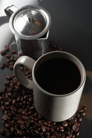 Hot morning coffee with fresh roasted coffee beansの写真素材
