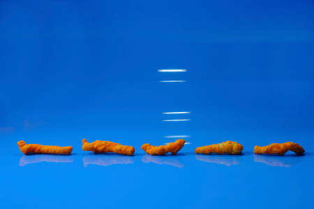 Cheese puff unhealthy junk food snack macro closeup