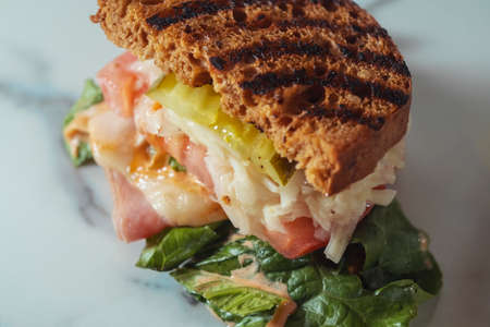 Toasted reuben ham sandwich with cole slaw and thousand island dressingの写真素材