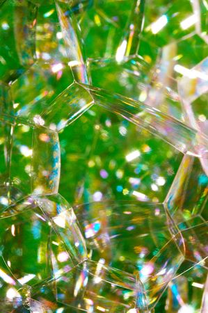 Macro of foam over green backgroundの写真素材