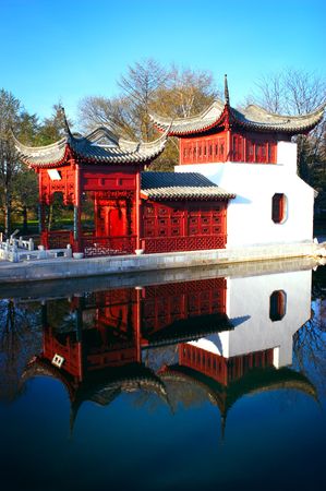 Chinese pagoda near a blue lake の写真素材