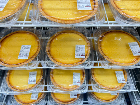 Costco triple cheese tart in Japan displayed in a shelf trayのeditorial素材