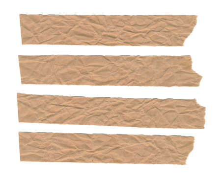 Torn strips of crumpled brown kraft paper isolated on white backgroundの写真素材