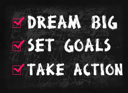 Dream big, set goal, take action word on blackboardの写真素材