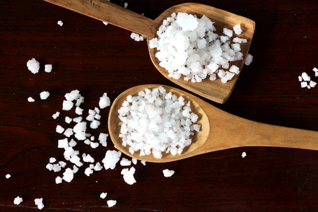 Sea salt on wooden tableの写真素材