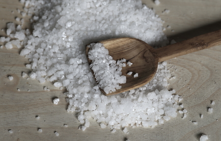 Sea salt on wooden tableの写真素材