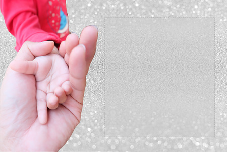 holding child hand for background with copy spaceの写真素材