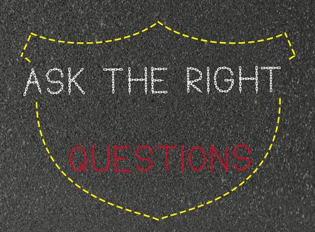 ask the right questions word on black backgroundの写真素材