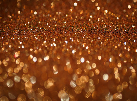 copper glitter bokeh abstract backgroundの写真素材