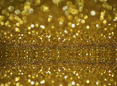 black and gold glitter bokeh texture abstract backgroundの写真素材