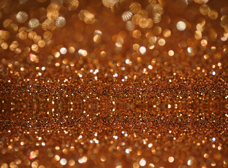 copper glitter bokeh abstract backgroundの写真素材