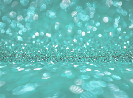 blue glitter bokeh abstract backgroundの写真素材
