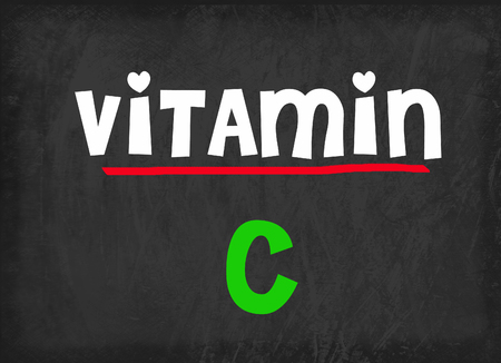 Vitamin C on blackboardの写真素材