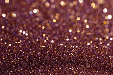 purple yellow glitter bokeh texture abstract backgroundの写真素材
