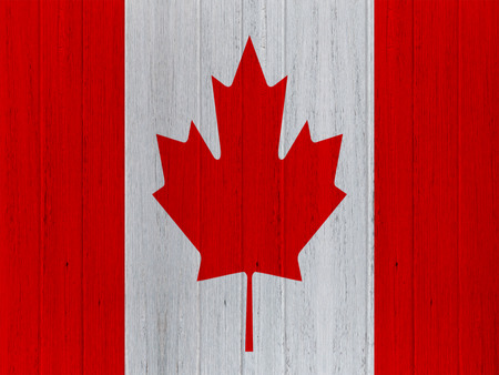 canadian flag on wood texture backgroundの写真素材