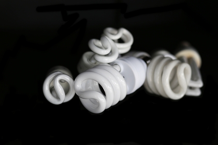 plug, light bulb, electric light, lamp on black backgroundの写真素材