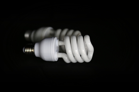 plug, light bulb, electric light, lamp on black backgroundの写真素材