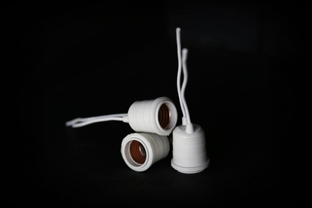 plug, light bulb, electric light, lamp on black backgroundの写真素材